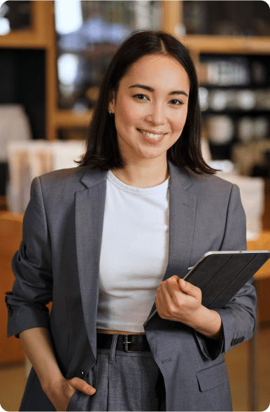 woman holding a tablet